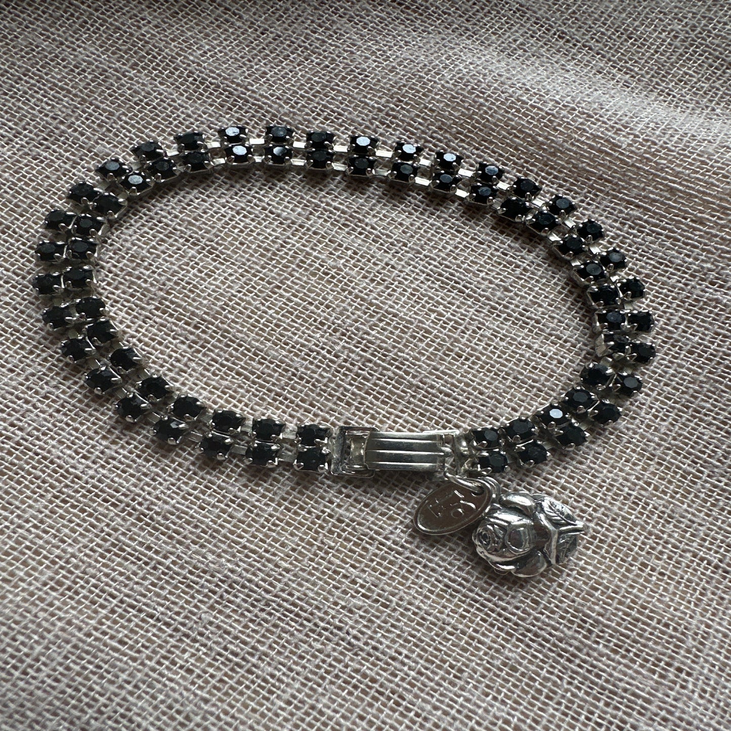 Floral rose-themed bracelet from Regilt – vintage romantic jewelry.
