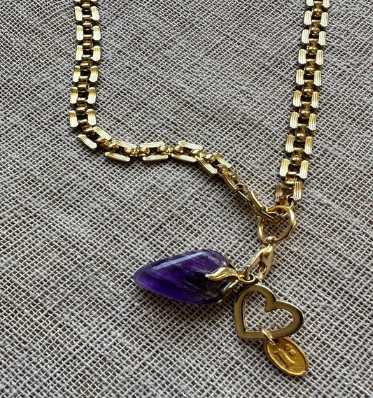 Heart charm necklace by Regilt â€“ emotional vintage-style jewelry.