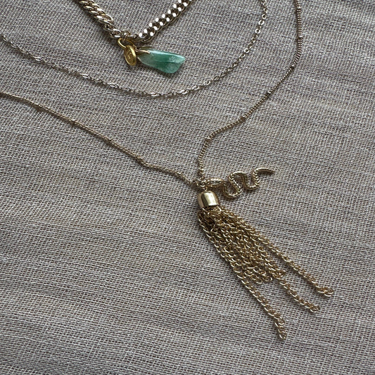 Layered vintage charm necklace by Regilt â€“ feminine and detailed.