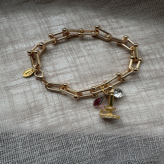 Keep Shining vintage charm bracelet from Regilt â€“ gold tone with elegant details.
