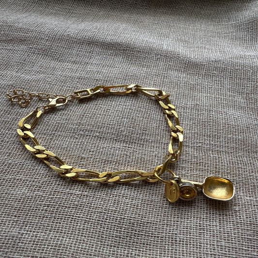 Whimsical charm bracelet with vintage kitchen charm accents by Regilt.