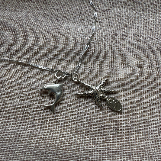 Celestial star-themed necklace by Regilt â€“ dreamy vintage jewelry.